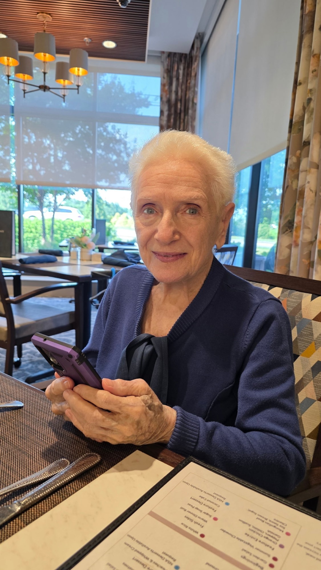 Our grandmother with the SimpleDial device